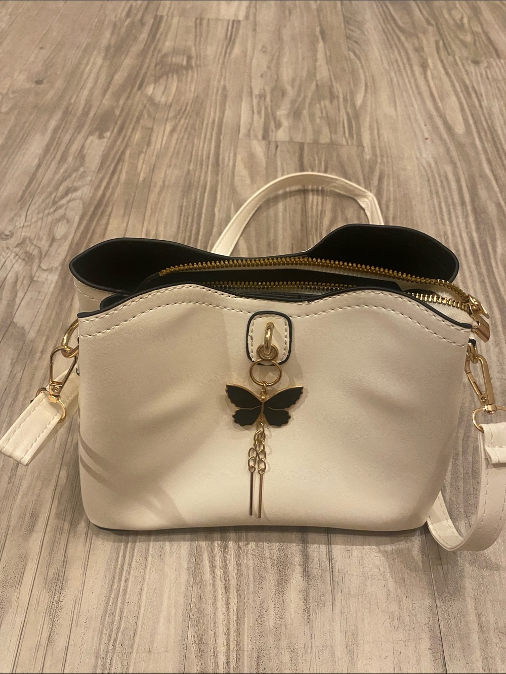 Target Cream Crossbody Bag with Black Butterfly Charm